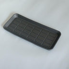 Black textured rectangular organizer tray for car interior storage