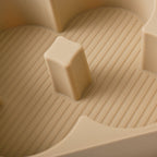 Beige non-slip silicone tray with textured ridges for secure BYD car accessory storage.