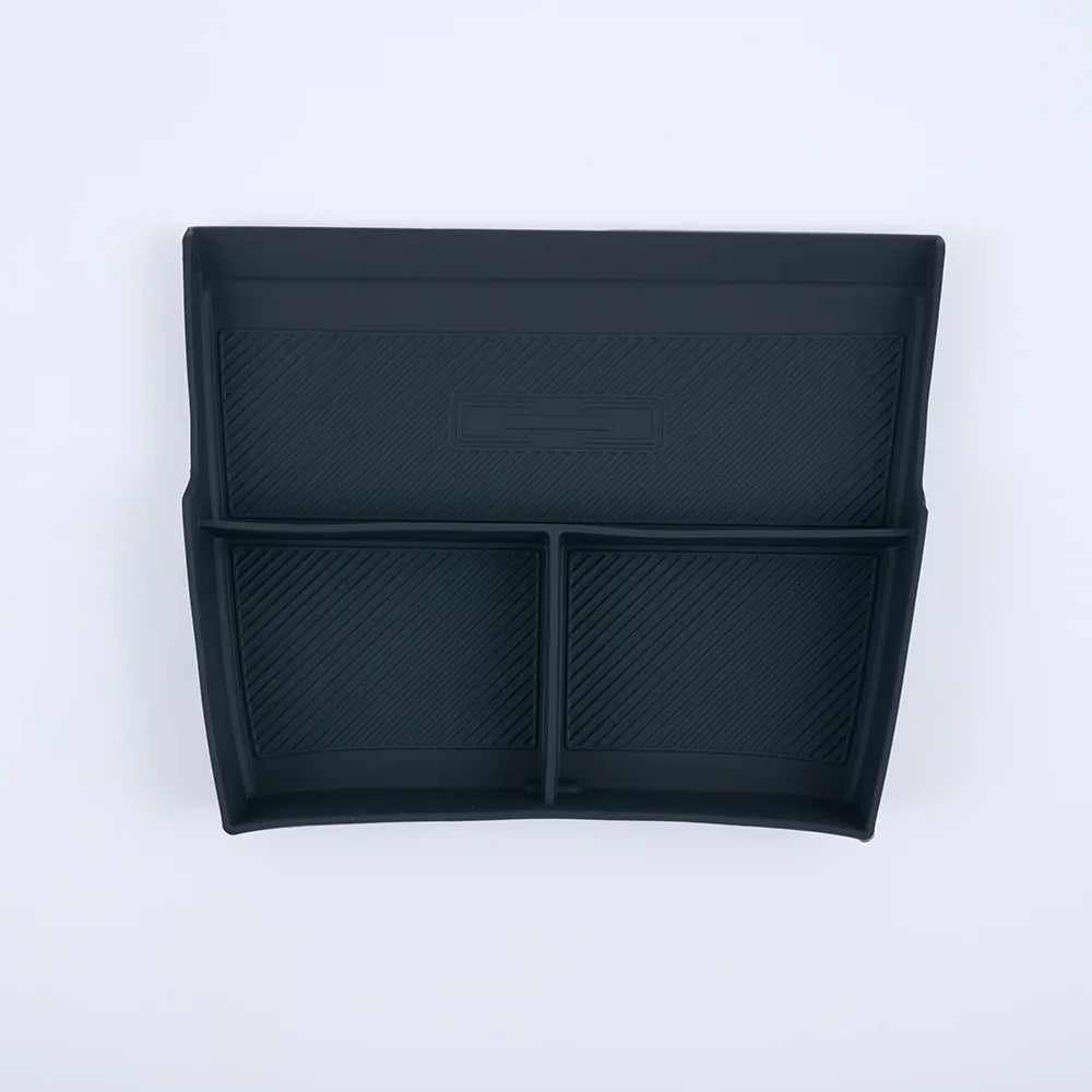 Professional black silicone car console organizer tray with ribbed anti-slip texture.