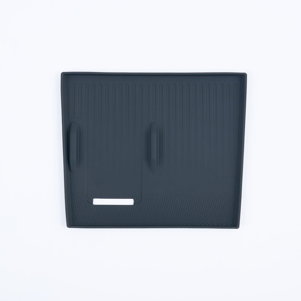 Black heavy-duty TPE rubber trunk mat with anti-slip texture and raised edges.
