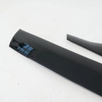 Glossy black aerodynamic side skirt trim made of durable high-gloss material.