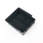 Black velvet-lined car center console organizer tray for BYD aftermarket storage.