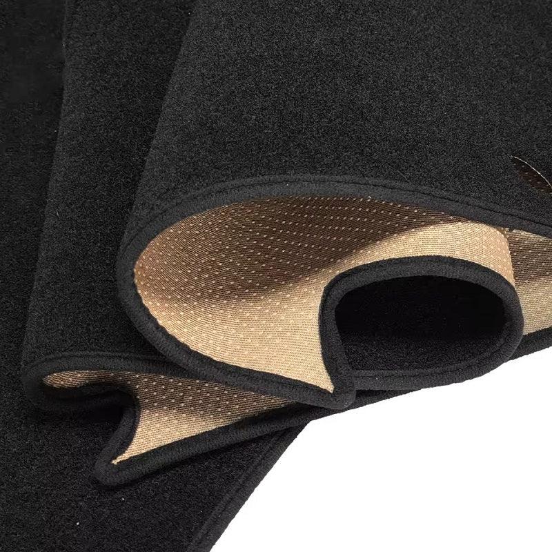 Black heavy-duty carpet car floor mat with a durable beige non-slip backing.