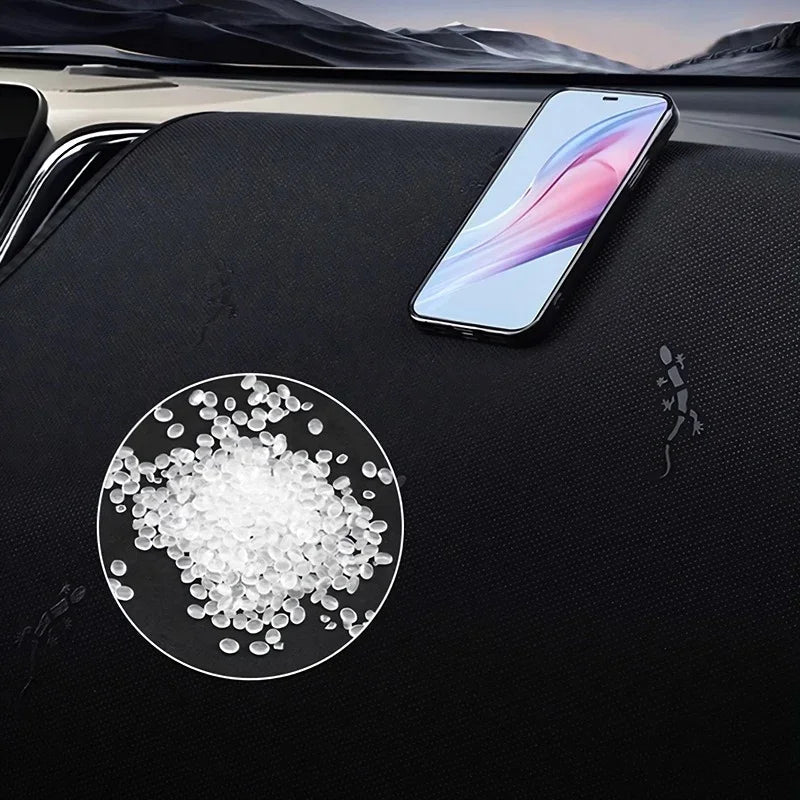 Black textured leather car mat featuring white absorbent granules for spill protection.
