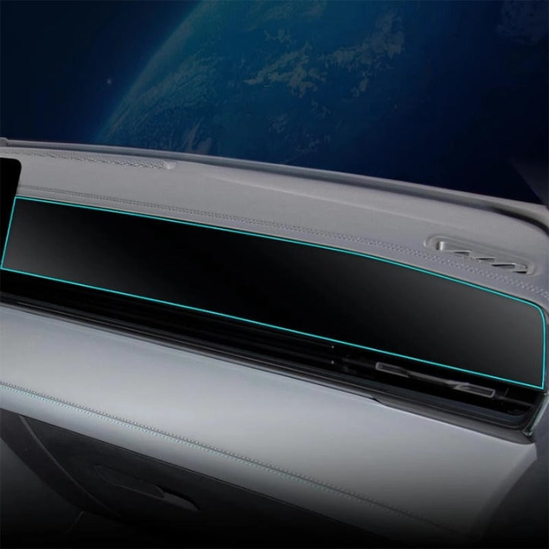 Black glossy dashboard trim with sleek cyan LED light strip for premium car interior styling.