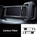 Black carbon fiber dashboard trim kit for BYD interior enhancement.