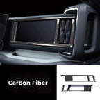 Black carbon fiber dashboard trim kit for BYD interior enhancement.