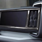 Black carbon fiber texture dashboard trim for BYD interior enhancement.