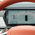 BYD car dashboard with orange leather interior and digital instrument display