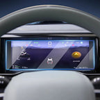 Digital dashboard display with navigation and vehicle data on a sleek car interior screen.