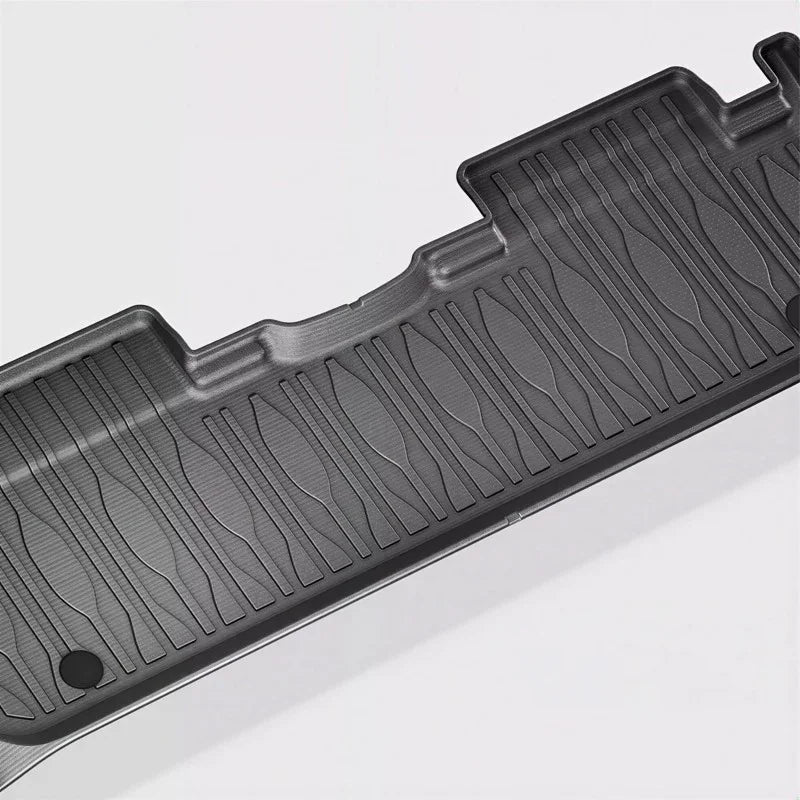 Durable black textured rubber cargo mat for car trunk protection