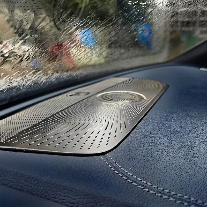 Silver metallic dashboard cover for BYD car featuring a unique radiating dot pattern.