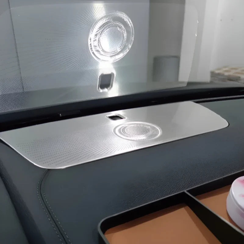 Silver patterned protective dashboard mat for BYD, made of durable waterproof material.