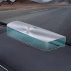 Sleek silver and translucent teal car organizer tray placed on a dark dashboard.