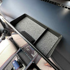 Black dual-compartment center console organizer tray with grey felt lining for BYD interior.
