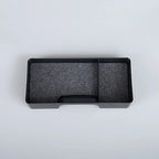 Black dual-compartment car center console organizer tray made of durable matte material.