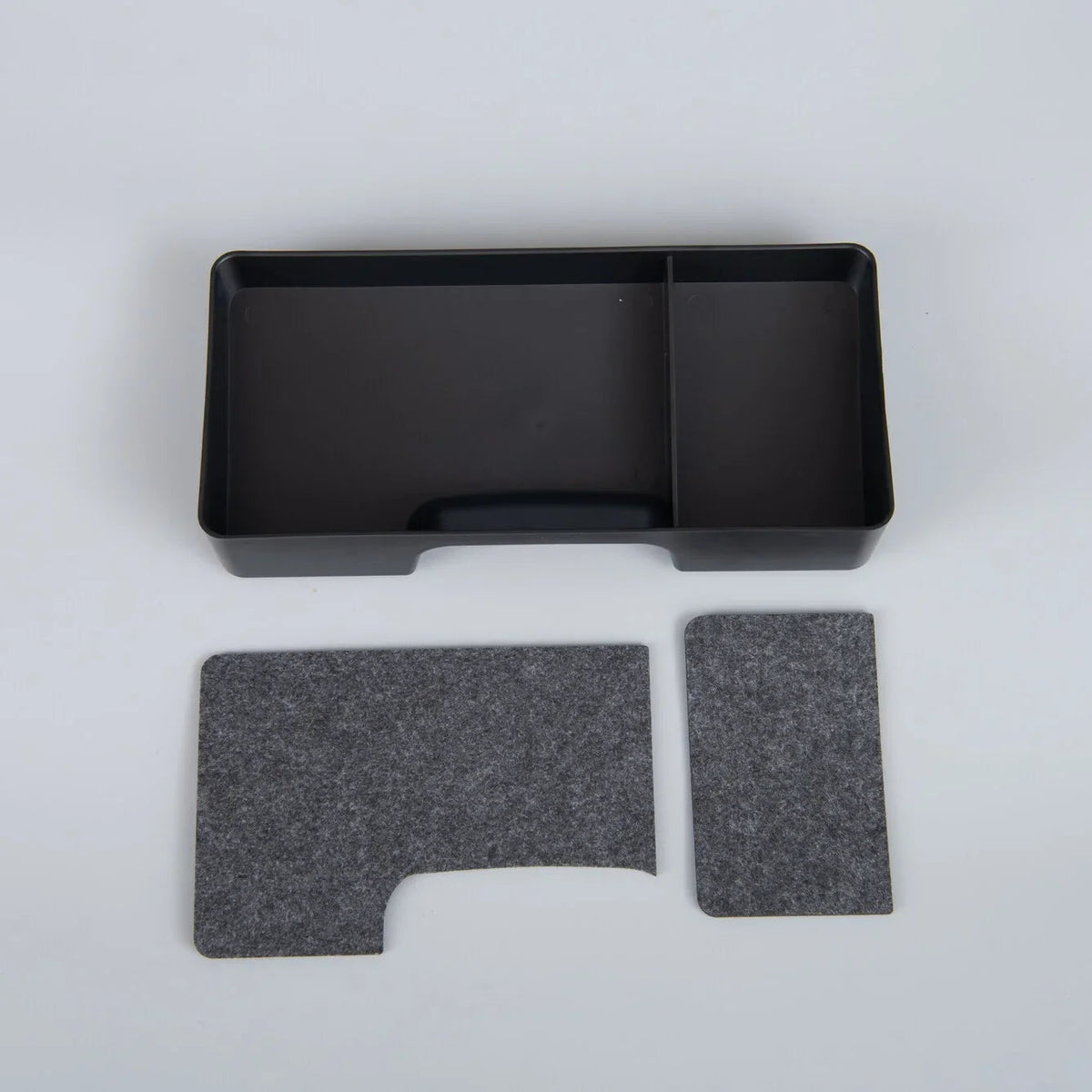 Black rectangular organizer tray and grey felt protective floor mats for car interior.