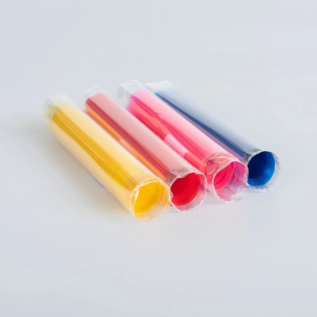 Set of four colorful plastic straw rolls in yellow, orange, pink, and blue packaging.