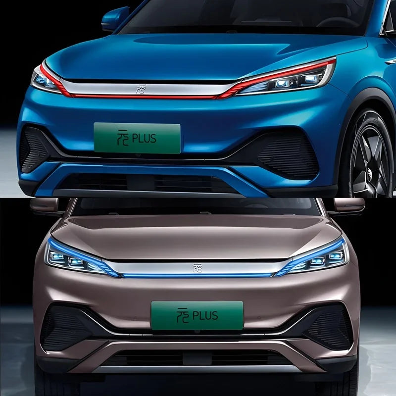 Front view of blue and bronze BYD Atto 3 electric cars featuring sleek modern designs.