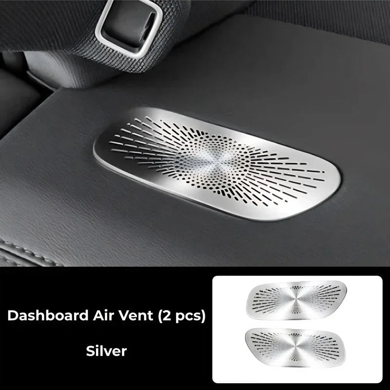 Silver metallic dashboard air vent with a unique radial perforated pattern for BYD interiors.