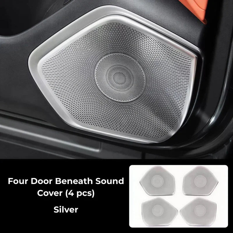 Set of 4 silver metallic sound covers for car door speakers, featuring a precise mesh design.