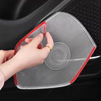 Transparent TPU protective film being applied to a car door pocket to prevent wear and tear.