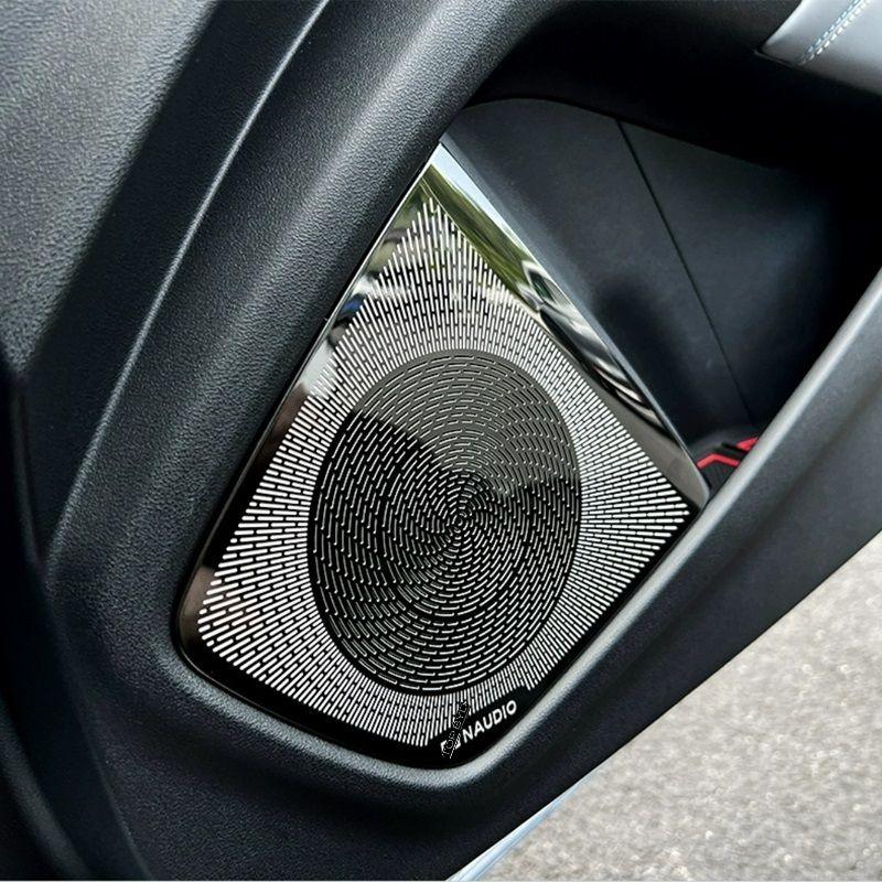 Premium silver and black patterned Naudio car door speaker grille with a metallic finish.