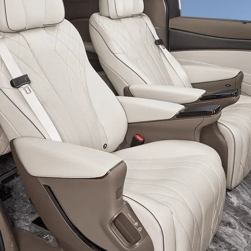 Premium cream-colored diamond-stitched leather car seats with ergonomic armrests.