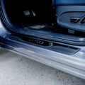 Black textured matte door sill protector with ATTO 3 embossed lettering for BYD protection.
