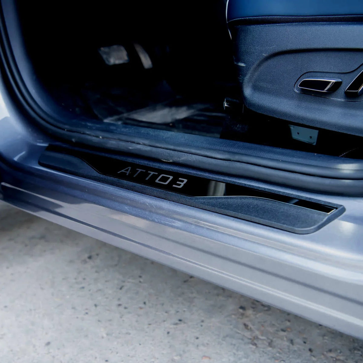 Black textured matte door sill protector with ATTO 3 embossed lettering for BYD protection.