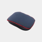 Premium navy blue leather car key fob cover with distinctive red contrast stitching.