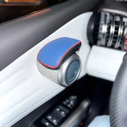Blue leather car cup holder with red stitching installed in a BYD vehicle interior.