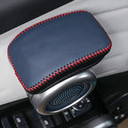 Premium black faux leather armrest cover with contrasting red stitching for BYD car interior.
