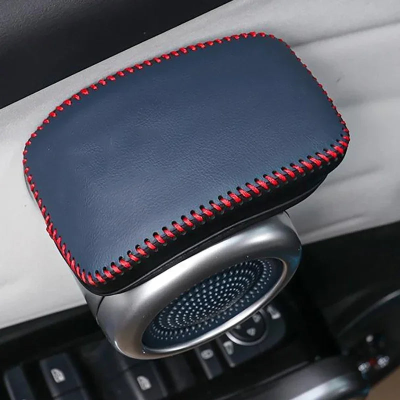 Premium black faux leather armrest cover with contrasting red stitching for BYD car interior.