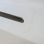 White protective car door handle film with a chrome handle accent.