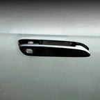 Glossy black car door handle cover with chrome trim and Chinese character emblem.