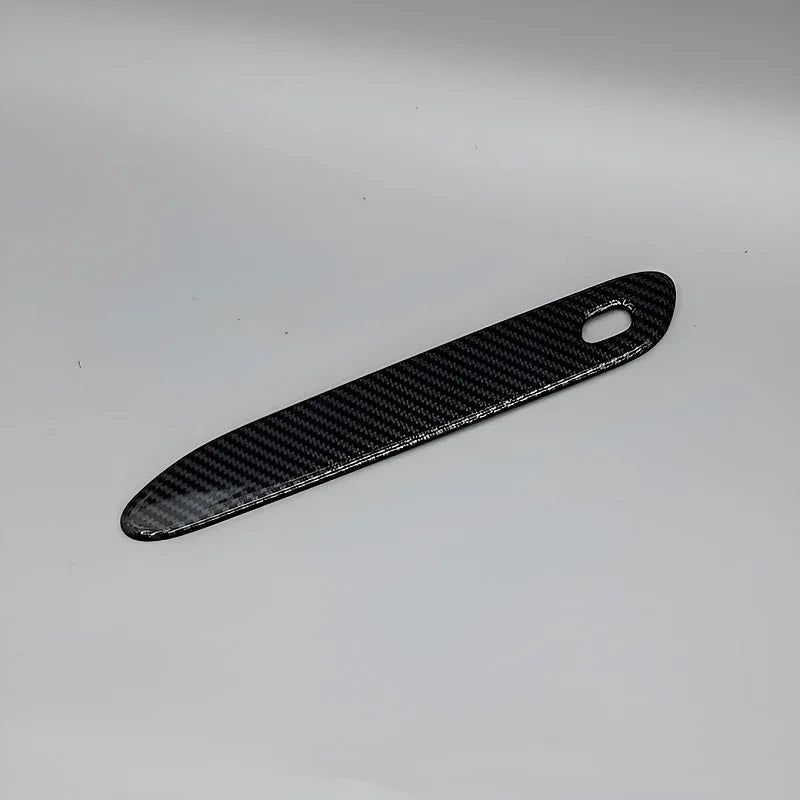 Sleek black carbon fiber patterned interior trim accessory for BYD vehicles.