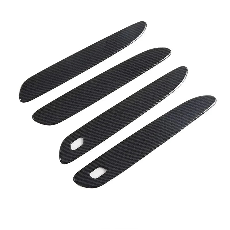Set of four black carbon fiber pattern interior door sill protectors for BYD cars