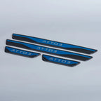 Black and blue ATTO 3 door sill protector plates with durable protective finish.
