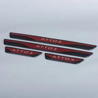 Red and black metallic ATTO 3 door sill protector plates with engraved lettering.