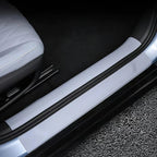 Sleek silver metallic door sill protector for BYD, providing durable scratch resistance.