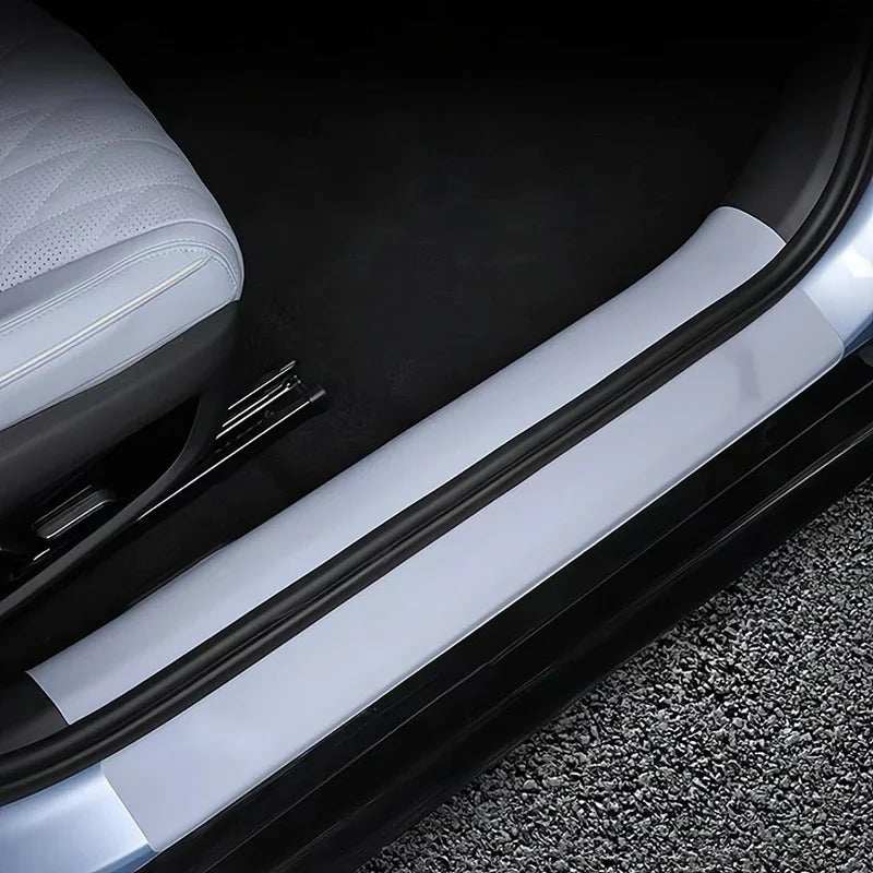 Sleek silver metallic door sill protector for BYD, providing durable scratch resistance.
