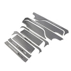 Set of grey premium textured car interior trim accessories for enhanced protection and style.