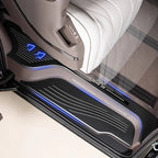 Black premium textured door sill plate with integrated blue LED lighting for BYD vehicle protection.