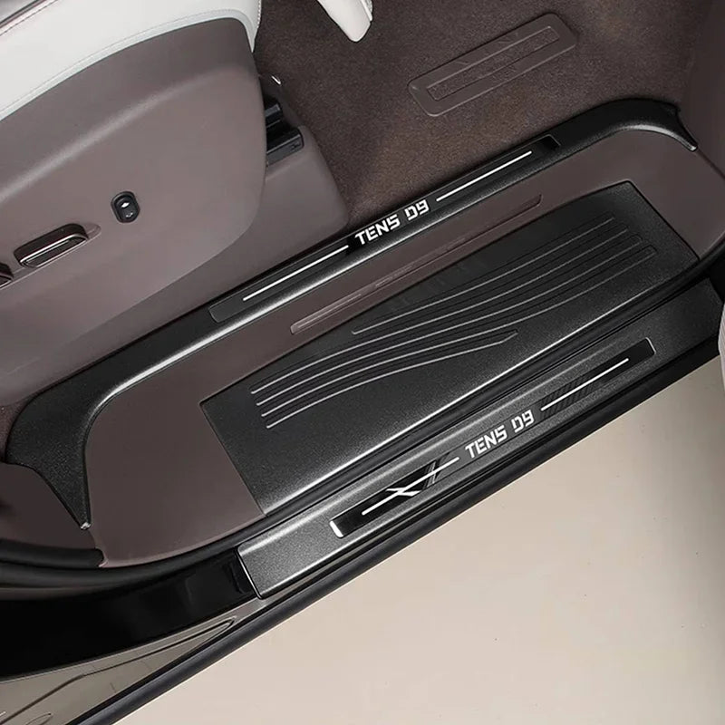 Premium black textured door sill plate for BYD, featuring a durable anti-slip surface and TENS D9 logo.