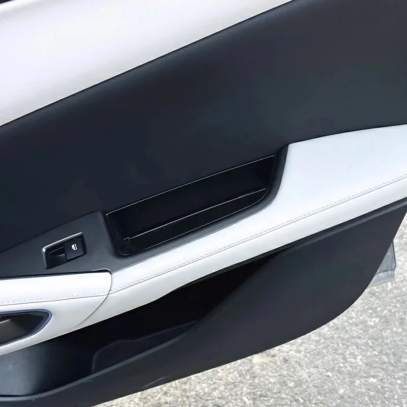Black door pocket organizer for BYD car interior, providing durable storage and protection.