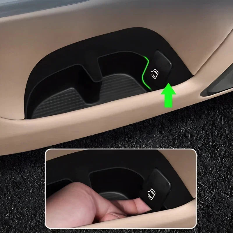 Black durable plastic sliding cover for BYD car door storage compartment.