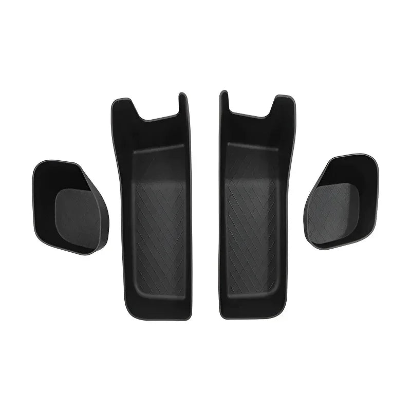 Set of four black durable plastic car interior storage trays with textured anti-slip lining