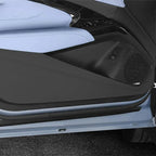 Black protective door sill plate and interior trim for BYD vehicle with light blue leather seats.