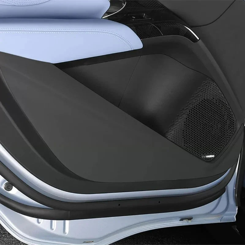Black matte textured door pocket trim and speaker grille for BYD interior protection.